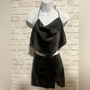 Black halter back top and leather skirt